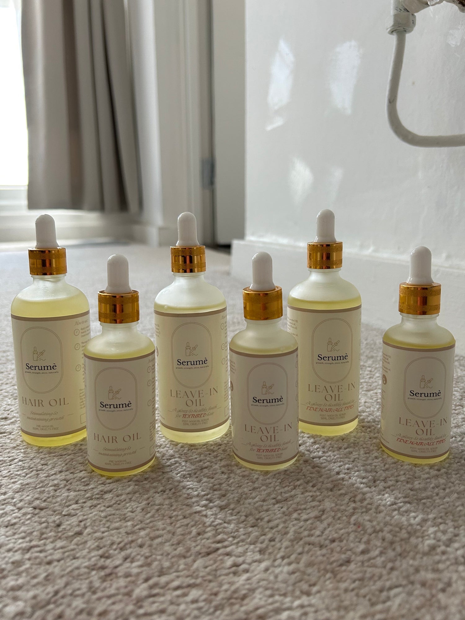 All Serume Hair oil products in sizes 50ml and 100ml including growth hair oil, leave-in hair oil for textured hair and leave-in hair oil for fine hair.